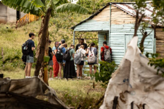 Mission team members standing outside a home in the Dominican Republic